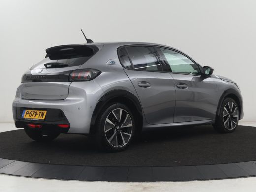 Peugeot e-208 | SOH 92,2% | Half leder | Stoelverwarming | Navigatie | Climate control | Carplay | Camera | Par... ActivLease financial lease