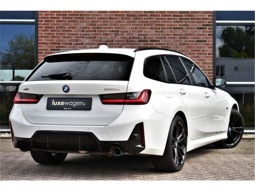 BMW 3 Serie Touring 320e xDrive M-Sport Pro Pano ACC Trekh El-zetels H/K 19inch ActivLease financial lease