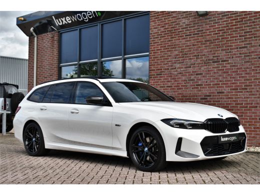 BMW 3 Serie Touring 320e xDrive M-Sport Pro Pano ACC Trekh El-zetels H/K 19inch ActivLease financial lease