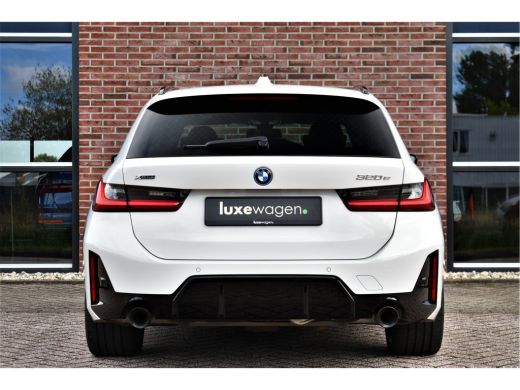 BMW 3 Serie Touring 320e xDrive M-Sport Pro Pano ACC Trekh El-zetels H/K 19inch ActivLease financial lease