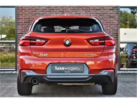 BMW X2 xDrive25e M-Sport | Sunset Orange | ACC | Leder | Elek-klep ActivLease financial lease