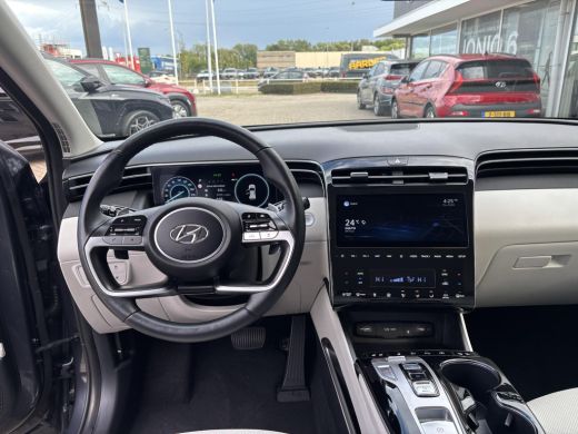 Hyundai Tucson 1.6 T-GDI PHEV Premium 4WD | SOH 97,5% | 360 graden camera | Dodehoekdetectie | elektrische stoel... ActivLease financial lease