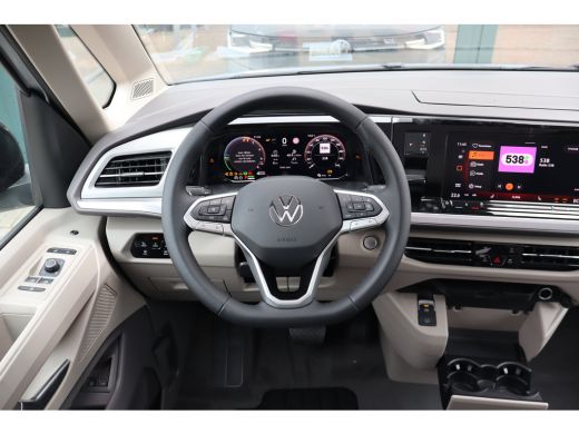 Volkswagen Multivan eHybrid 4MOTION L2 | Bulli | Leder | Glazen Dak | Vis-a-Vis | Houtlook Vloer | 4-Seizoenen Banden ActivLease financial lease