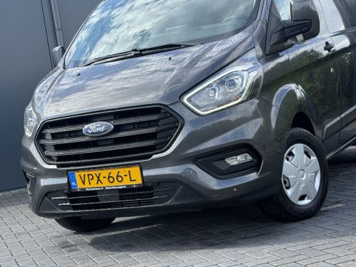 Ford Transit Custom 2.0 TDCI / L1H1 / 1e EIG. / AIRCO / CRUISE / NAVI / LED / 2.5 TONS TREKHAAK / 3-ZITS / PDC ActivLease financial lease