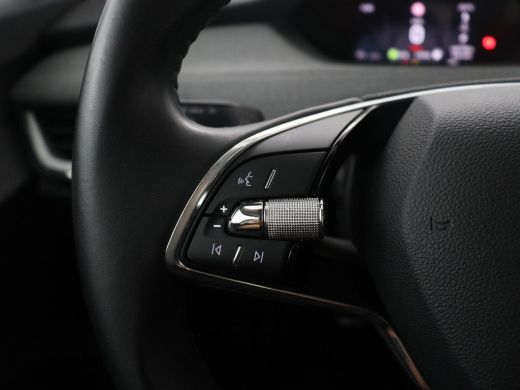 Skoda Enyaq iV | SOH 91,0% | Half leder | Cruise control | Carplay | Navigatie | Sfeerverlichting | Climate cont... ActivLease financial lease