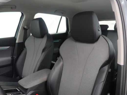 Skoda Enyaq iV | SOH 91,0% | Half leder | Cruise control | Carplay | Navigatie | Sfeerverlichting | Climate cont... ActivLease financial lease