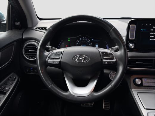 Hyundai Kona Premium 64 kWh | Stoelventilatie | Adap. Cruise | Leder | Adap. Cruise | Apple Carplay ActivLease financial lease