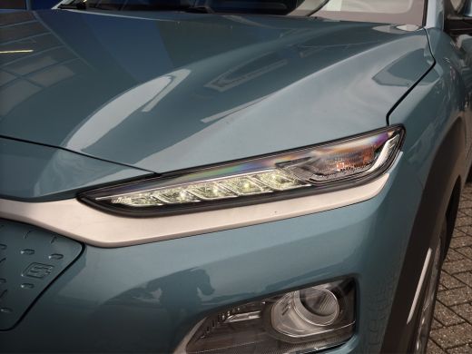 Hyundai Kona Premium 64 kWh | Stoelventilatie | Adap. Cruise | Leder | Adap. Cruise | Apple Carplay ActivLease financial lease