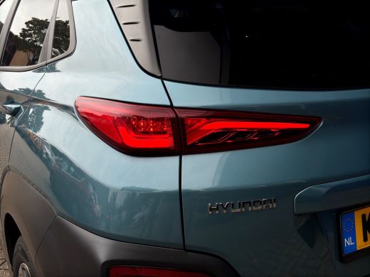Hyundai Kona Premium 64 kWh | Stoelventilatie | Adap. Cruise | Leder | Adap. Cruise | Apple Carplay ActivLease financial lease