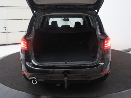 BMW 2 Serie Gran Tourer 218i Business Edition Plus | Trekhaak | Head up | Half Leder | Climate control | Park... ActivLease financial lease