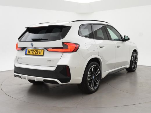 BMW iX1 eDrive20 67 kWh M-SPORT *46 KM NIEUW* + PANORAMA | PREMIUM | 19 INCH | M-REMMEN ActivLease financial lease