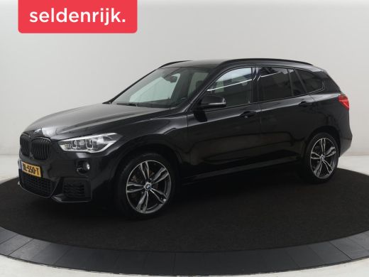 BMW X1 sDrive20i High Executive M-sport | Leder | Memory | Harman/Kardon | Head-up | Cruise control | St... ActivLease financial lease
