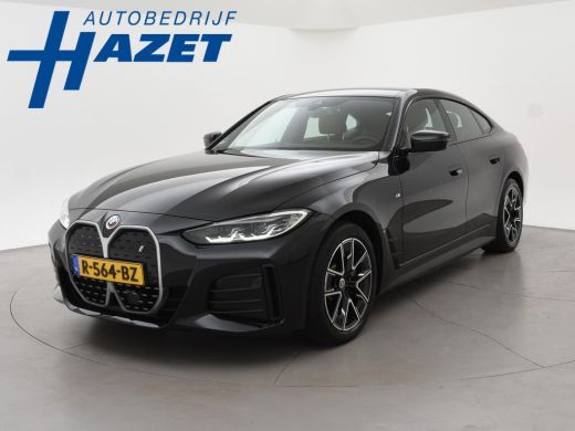 BMW i4 eDrive40 84 kWh M-SPORT + ADAPTIVE CRUISE | SFEERVERLICHTING | LEDER SPORTINTERIEUR ActivLease financial lease