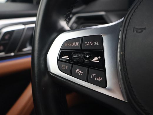 BMW i4 eDrive40 84 kWh M-SPORT + ADAPTIVE CRUISE | SFEERVERLICHTING | LEDER SPORTINTERIEUR ActivLease financial lease