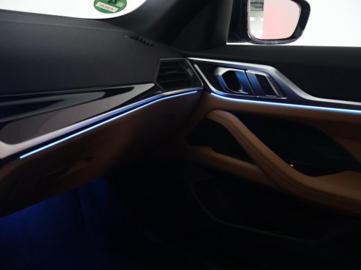 BMW i4 eDrive40 84 kWh M-SPORT + ADAPTIVE CRUISE | SFEERVERLICHTING | LEDER SPORTINTERIEUR ActivLease financial lease