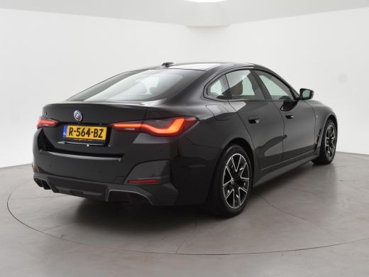 BMW i4 eDrive40 84 kWh M-SPORT + ADAPTIVE CRUISE | SFEERVERLICHTING | LEDER SPORTINTERIEUR ActivLease financial lease