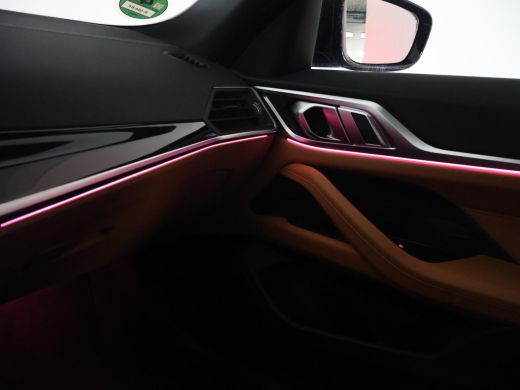 BMW i4 eDrive40 84 kWh M-SPORT + ADAPTIVE CRUISE | SFEERVERLICHTING | LEDER SPORTINTERIEUR ActivLease financial lease