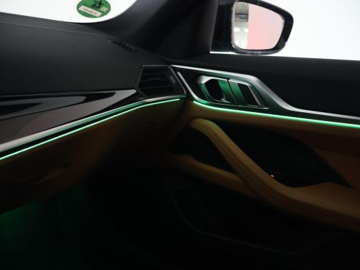 BMW i4 eDrive40 84 kWh M-SPORT + ADAPTIVE CRUISE | SFEERVERLICHTING | LEDER SPORTINTERIEUR ActivLease financial lease
