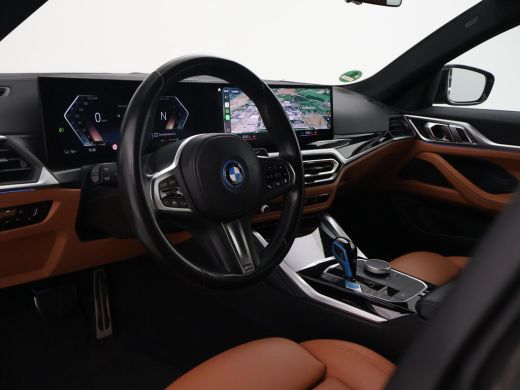 BMW i4 eDrive40 84 kWh M-SPORT + ADAPTIVE CRUISE | SFEERVERLICHTING | LEDER SPORTINTERIEUR ActivLease financial lease
