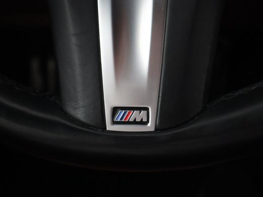 BMW i4 eDrive40 84 kWh M-SPORT + ADAPTIVE CRUISE | SFEERVERLICHTING | LEDER SPORTINTERIEUR ActivLease financial lease