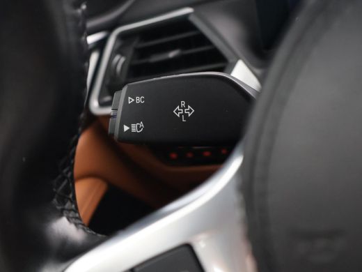 BMW i4 eDrive40 84 kWh M-SPORT + ADAPTIVE CRUISE | SFEERVERLICHTING | LEDER SPORTINTERIEUR ActivLease financial lease