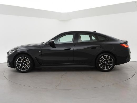 BMW i4 eDrive40 84 kWh M-SPORT + ADAPTIVE CRUISE | SFEERVERLICHTING | LEDER SPORTINTERIEUR ActivLease financial lease