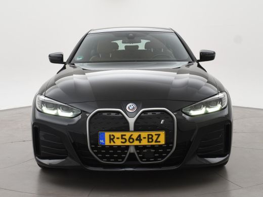 BMW i4 eDrive40 84 kWh M-SPORT + ADAPTIVE CRUISE | SFEERVERLICHTING | LEDER SPORTINTERIEUR ActivLease financial lease