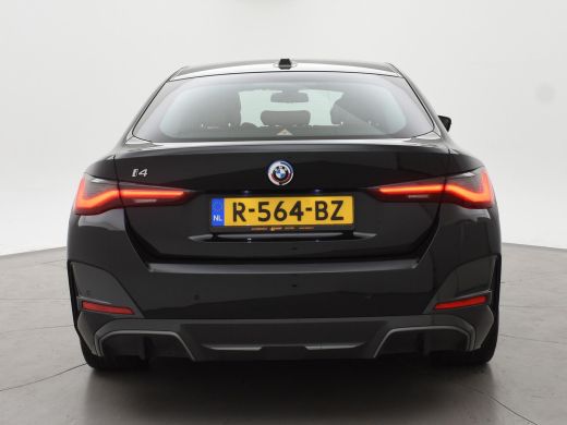 BMW i4 eDrive40 84 kWh M-SPORT + ADAPTIVE CRUISE | SFEERVERLICHTING | LEDER SPORTINTERIEUR ActivLease financial lease