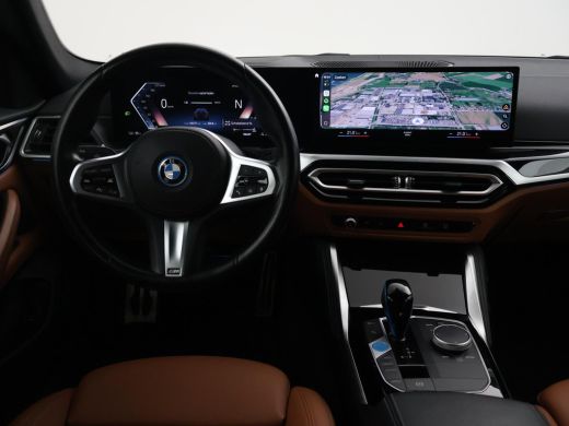 BMW i4 eDrive40 84 kWh M-SPORT + ADAPTIVE CRUISE | SFEERVERLICHTING | LEDER SPORTINTERIEUR ActivLease financial lease