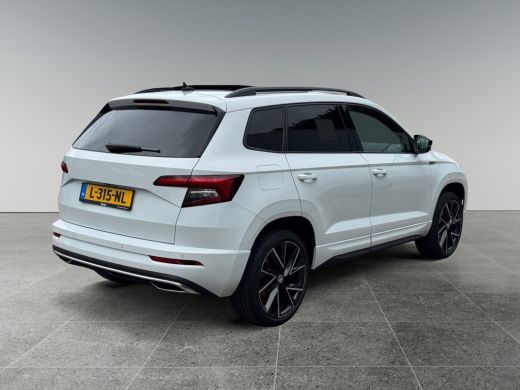 Skoda Karoq 1.5 150pk TSI ACT Sportline Business Panoramadak | Extra getint glas achter | Navigatiesysteem fu... ActivLease financial lease