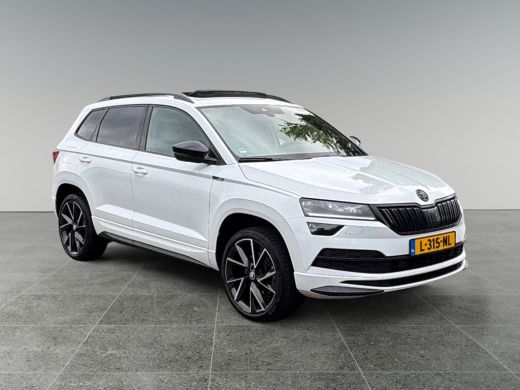 Skoda Karoq 1.5 150pk TSI ACT Sportline Business Panoramadak | Extra getint glas achter | Navigatiesysteem fu... ActivLease financial lease