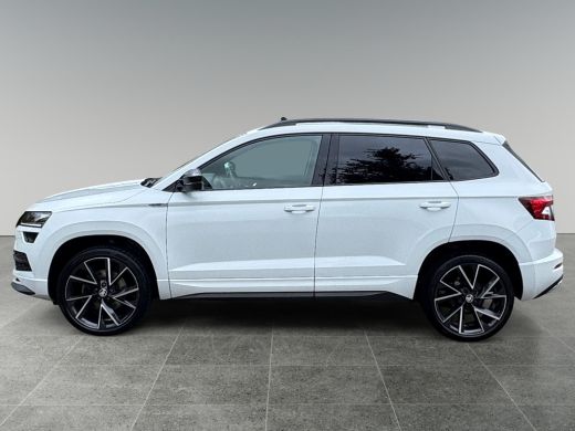 Skoda Karoq 1.5 150pk TSI ACT Sportline Business Panoramadak | Extra getint glas achter | Navigatiesysteem fu... ActivLease financial lease