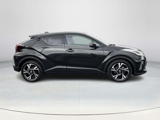Toyota C-HR 1.8 Hybrid Style | Carplay | Parkeersensoren | Dode hoek waarschuwing | Navigatie | 18 inch LM-ve... ActivLease financial lease