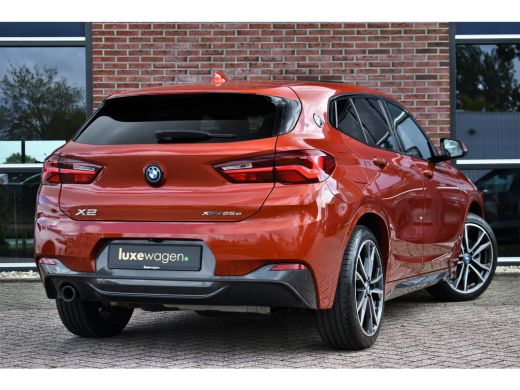BMW X2 xDrive25e M-Sport | Pano | HUD | Sunset orange | 19 inch | Camera ActivLease financial lease