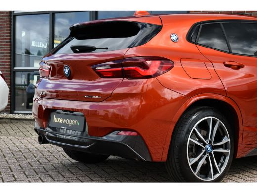BMW X2 xDrive25e M-Sport | Pano | HUD | Sunset orange | 19 inch | Camera ActivLease financial lease