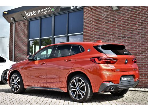 BMW X2 xDrive25e M-Sport | Pano | HUD | Sunset orange | 19 inch | Camera ActivLease financial lease