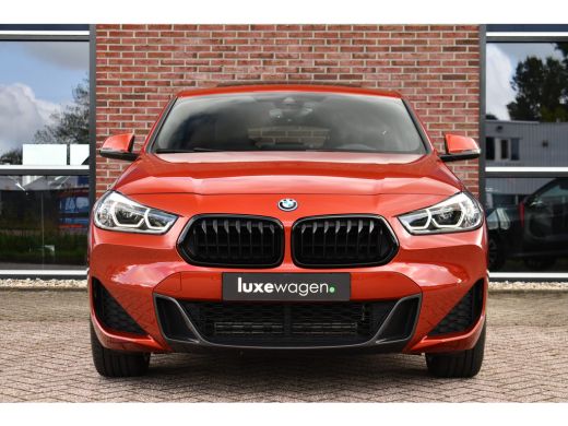 BMW X2 xDrive25e M-Sport | Pano | HUD | Sunset orange | 19 inch | Camera ActivLease financial lease