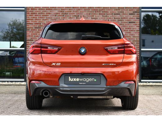BMW X2 xDrive25e M-Sport | Pano | HUD | Sunset orange | 19 inch | Camera ActivLease financial lease