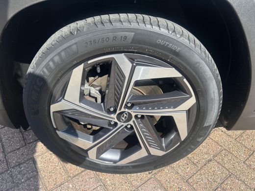 Hyundai Tucson 1.6 T-GDI HEV Premium | Trekhaak | Stoelverwarming & ventilatie | Stuurverwarming | Elek. stoelen... ActivLease financial lease