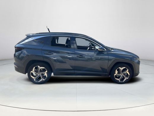 Hyundai Tucson 1.6 T-GDI HEV Premium | Trekhaak | Stoelverwarming & ventilatie | Stuurverwarming | Elek. stoelen... ActivLease financial lease