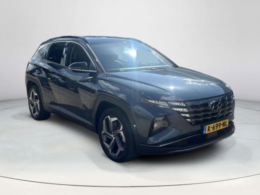 Hyundai Tucson 1.6 T-GDI HEV Premium | Trekhaak | Stoelverwarming & ventilatie | Stuurverwarming | Elek. stoelen... ActivLease financial lease