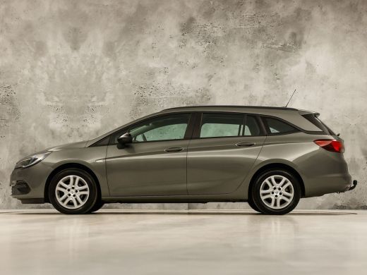Opel Astra Sports Tourer 1.2 Sport (APPLE CARPLAY, NAVIGATIE, CRUISE, TREKHAAK, SPORTSTOELEN, PARKEERSENSORE... ActivLease financial lease