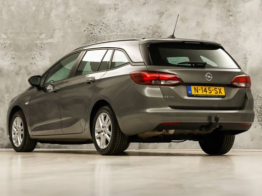 Opel Astra Sports Tourer 1.2 Sport (APPLE CARPLAY, NAVIGATIE, CRUISE, TREKHAAK, SPORTSTOELEN, PARKEERSENSORE... ActivLease financial lease