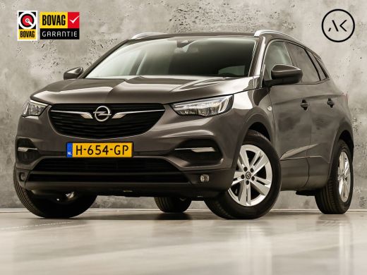 Opel Grandland X 1.2 Turbo Sport Automaat (APPLE CARPLAY, GROOT NAVI, CLIMATE, STUUR/STOELVERWARMING, SPORTSTOELEN... ActivLease financial lease