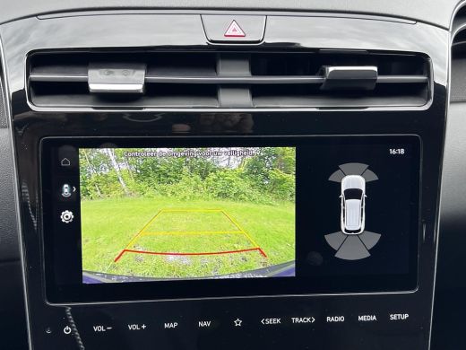 Hyundai Tucson 1.6 T-GDI PHEV Comfort Smart 4WD / Fabrieksgarantie tot 02-2027 / Afn. trekhaak 1.350 kg / Naviga... ActivLease financial lease