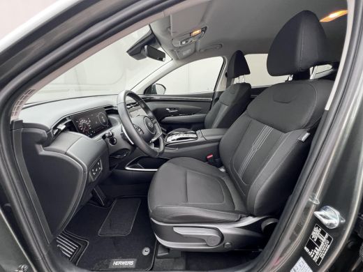 Hyundai Tucson 1.6 T-GDI PHEV Comfort Smart 4WD / Fabrieksgarantie tot 02-2027 / Afn. trekhaak 1.350 kg / Naviga... ActivLease financial lease