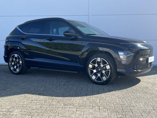 Hyundai Kona Premium 64.8 kWh / Uit Voorraad Leverbaar / Navigatie / Stoel verkoeling&Verwarming voorzijde / ActivLease financial lease