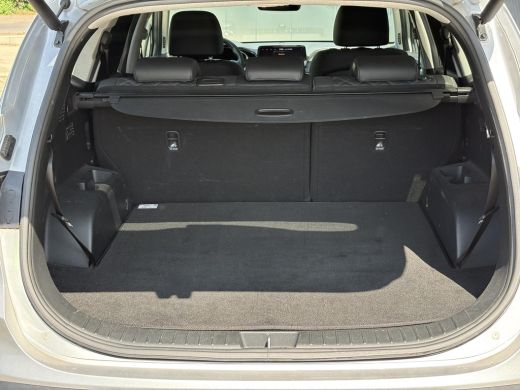 Hyundai Santa Fe 1.6 T-GDI PHEV Premium Sky 7p. SOH 100% / Elektrisch glazen panorama-dak / Automaat / All-season ... ActivLease financial lease