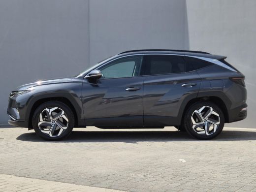Hyundai Tucson 1.6 T-GDI PHEV Comfort Smart 4WD / Dealer onderhouden / Fabrieksgarantie tot 05-2027 / All season... ActivLease financial lease