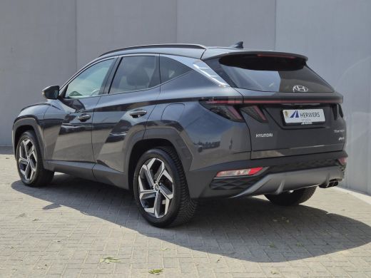 Hyundai Tucson 1.6 T-GDI PHEV Comfort Smart 4WD / Dealer onderhouden / Fabrieksgarantie tot 05-2027 / All season... ActivLease financial lease